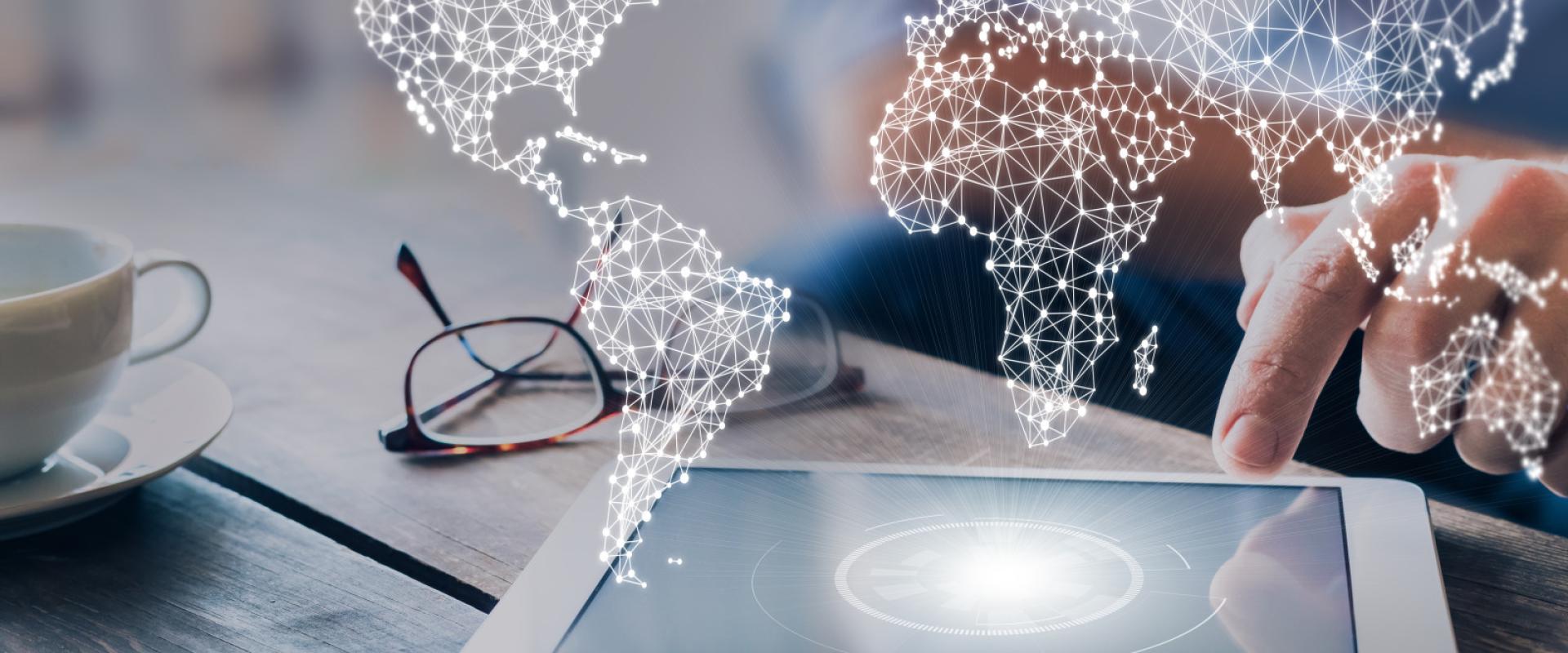 Réseau d'affaires international avec lignes connectées, communication mondiale pour l'internet des objets, la finance, le commerce, les technologies de blockchain et web, homme d'affaires utilisant une tablette. - © BRGM Réseau d'affaires