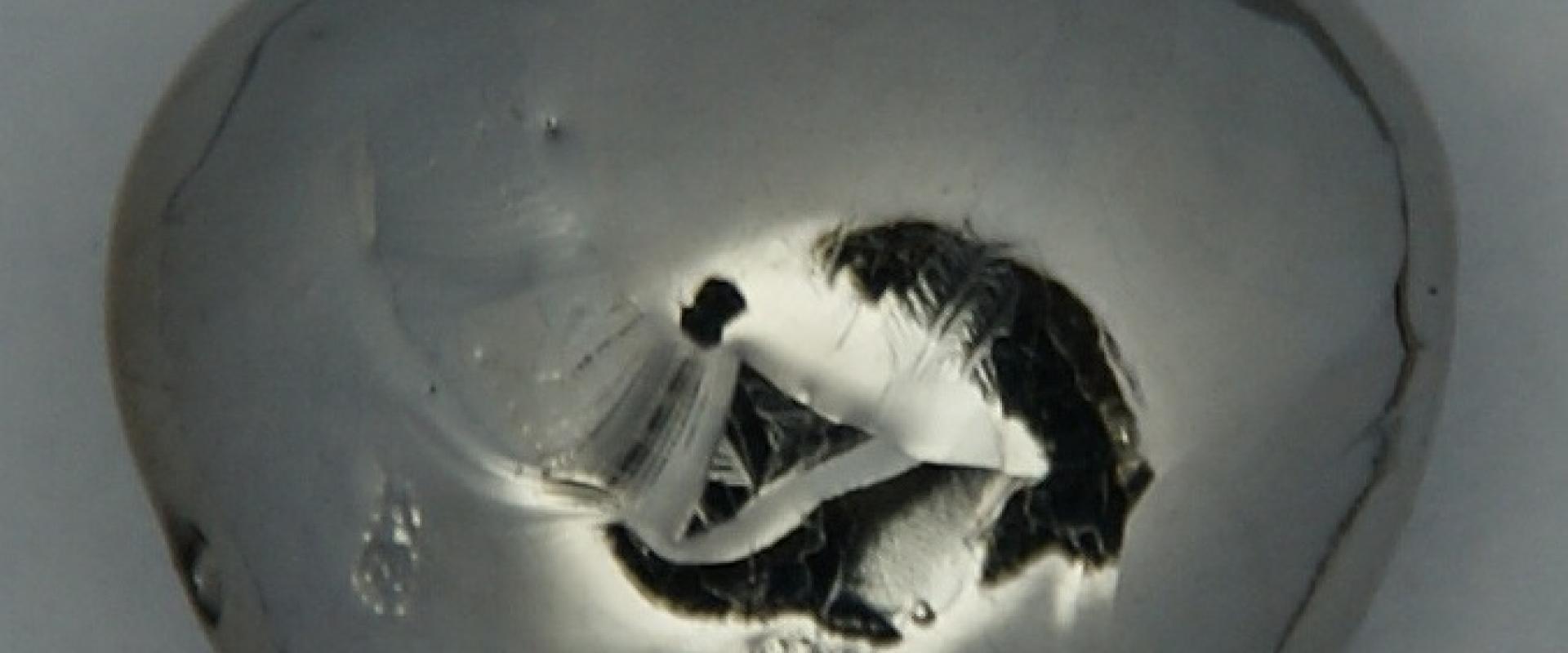 Pure rhenium bead, arc melted, 21 grams. 